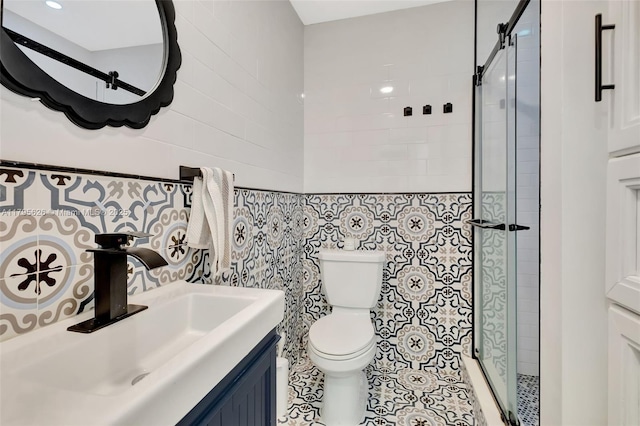 1901 NW S River Dr Unit 14-B, Miami, FL 33125 - bathroom with a stall shower, tile walls, toilet, vanity, and tile patterned flooring