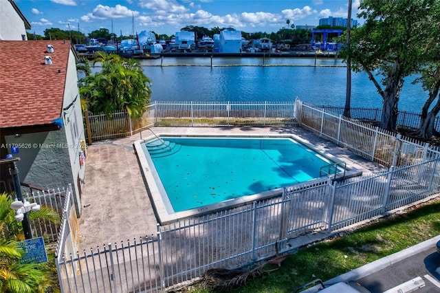 1901 NW S River Dr Unit 14-B, Miami, FL 33125 - community pool featuring a water view and a fenced backyard