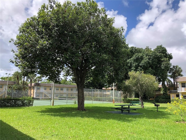 5156 NE 6th Ave Unit 205, Oakland Park, FL 33334 - view of community with a tennis court