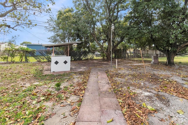 view of yard featuring fence