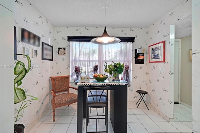 10217 NW 24th Pl Unit 107, Sunrise, FL 33322 - dining area with wallpapered walls and a textured ceiling