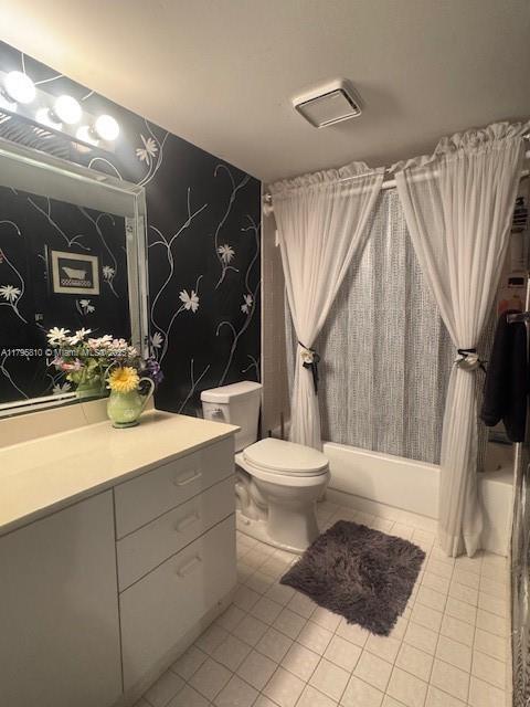 bathroom with shower / tub combo, wallpapered walls, toilet, tile patterned flooring, and vanity