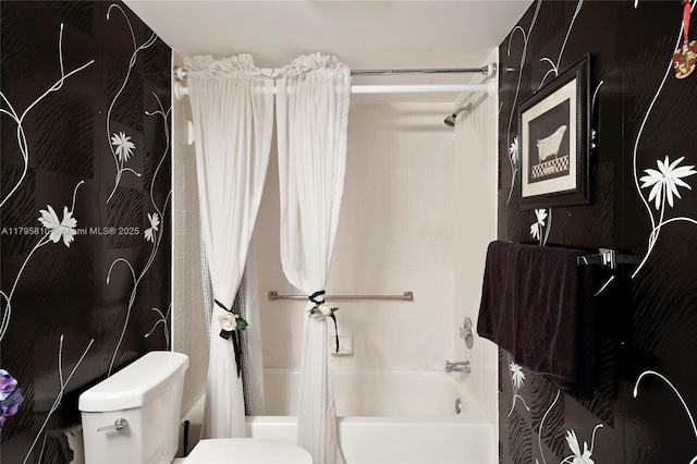 bathroom with toilet and shower / bath combo with shower curtain