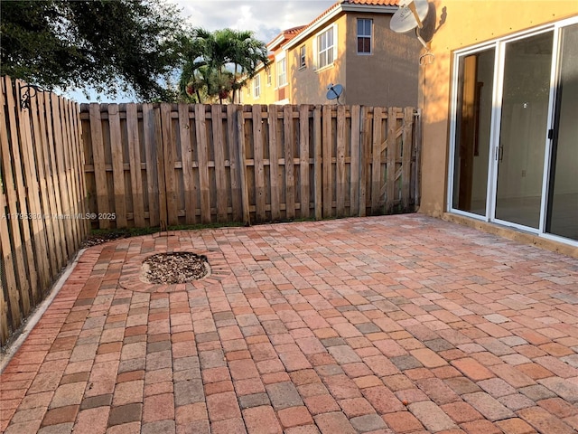 view of patio with fence