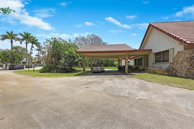 view of car parking featuring driveway