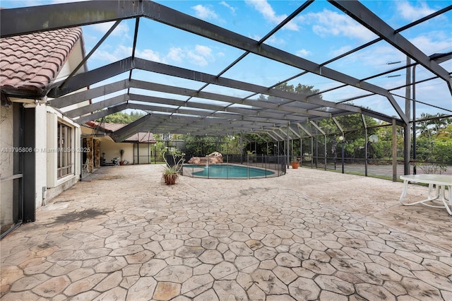 pool with a patio and a lanai
