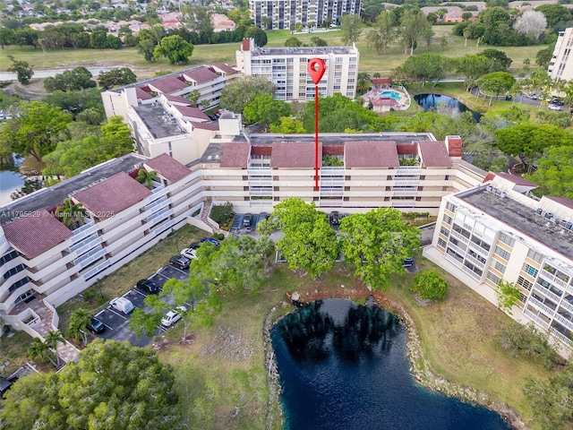 bird's eye view with a water view