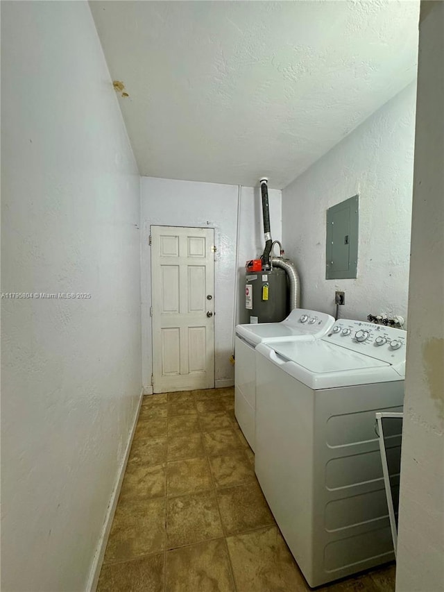 2100 NE 173rd St, North Miami Beach, FL 33162 - washroom featuring laundry area, water heater, baseboards, washer and clothes dryer, and electric panel