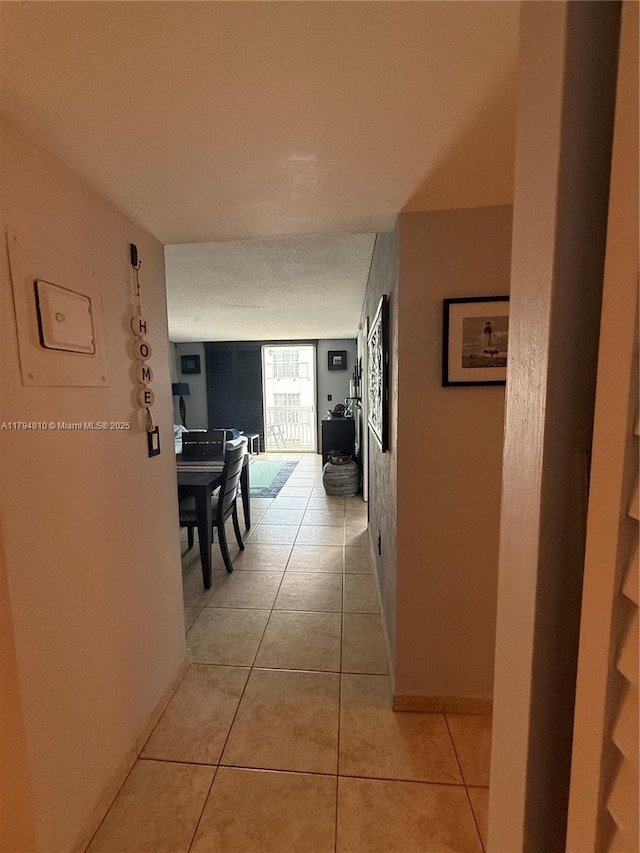 401 Ocean Dr Unit 324, Miami Beach, FL 33139 - corridor with light tile patterned floors