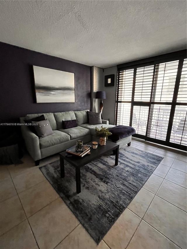 401 Ocean Dr Unit 324, Miami Beach, FL 33139 - tiled living room with a textured ceiling