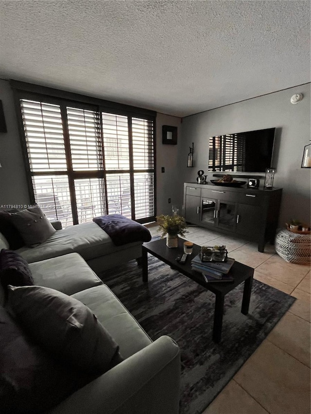 401 Ocean Dr Unit 324, Miami Beach, FL 33139 - living area with light tile patterned floors and a textured ceiling