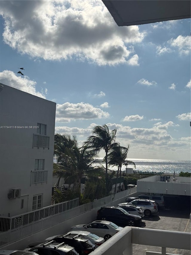 401 Ocean Dr Unit 324, Miami Beach, FL 33139 - view of building exterior featuring uncovered parking and a water view