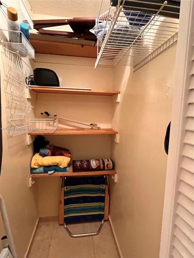 401 Ocean Dr Unit 324, Miami Beach, FL 33139 - spacious closet with tile patterned floors