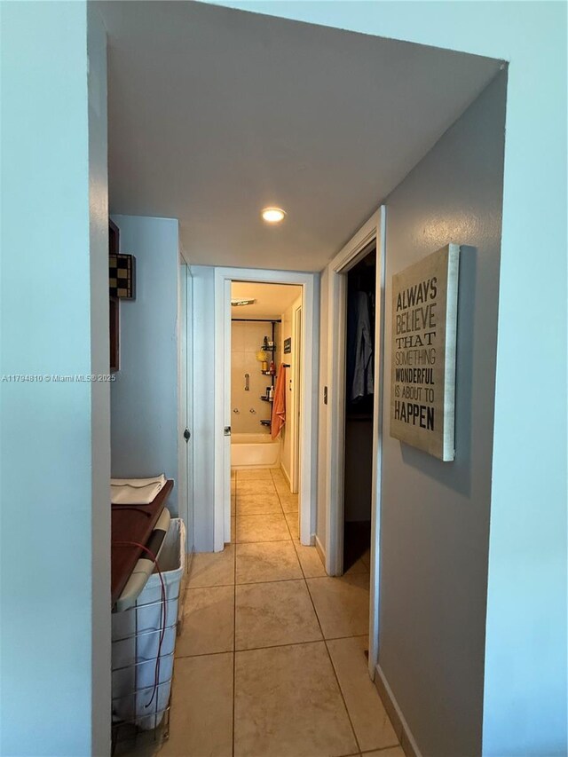 401 Ocean Dr Unit 324, Miami Beach, FL 33139 - corridor with light tile patterned flooring and recessed lighting