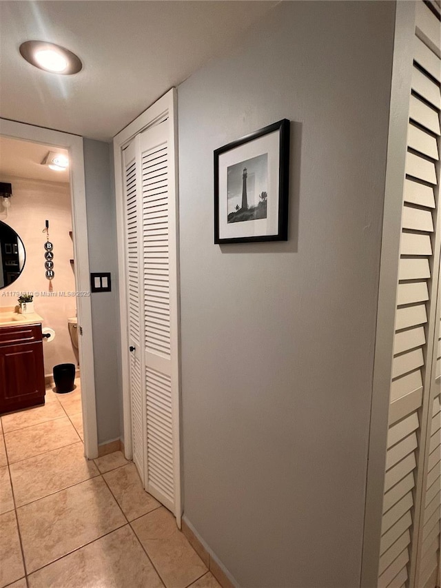 401 Ocean Dr Unit 324, Miami Beach, FL 33139 - hall featuring light tile patterned flooring