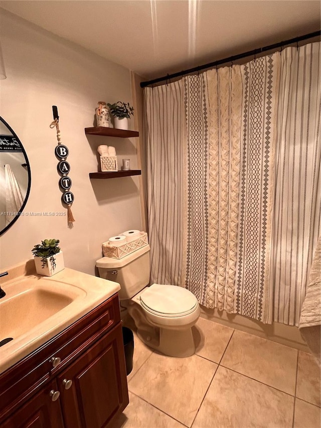 401 Ocean Dr Unit 324, Miami Beach, FL 33139 - bathroom featuring vanity, tile patterned floors, and curtained shower