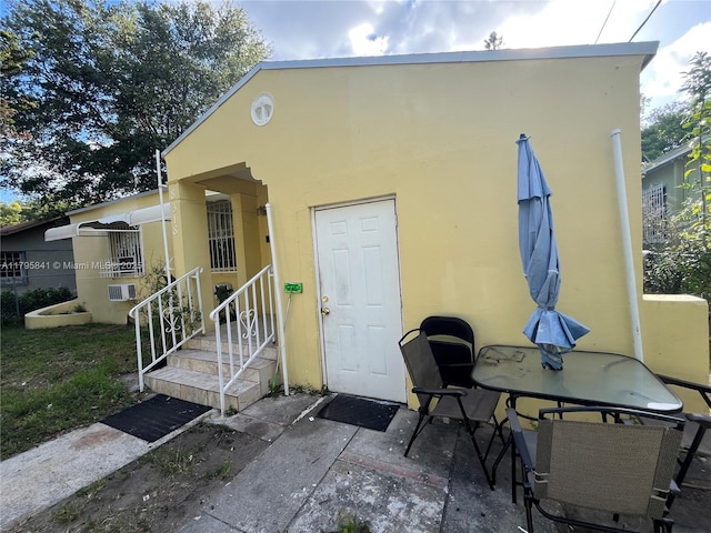 8318 NE 3rd Ct, Miami, FL 33138 - exterior space featuring stucco siding and cooling unit