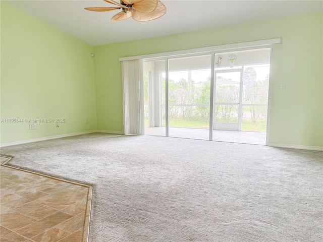 2857 Brewster St, North Port, FL 34288 - empty room featuring plenty of natural light, a ceiling fan, carpet floors, and baseboards