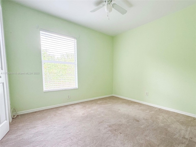 2857 Brewster St, North Port, FL 34288 - spare room featuring healthy amount of natural light, carpet, a ceiling fan, and baseboards