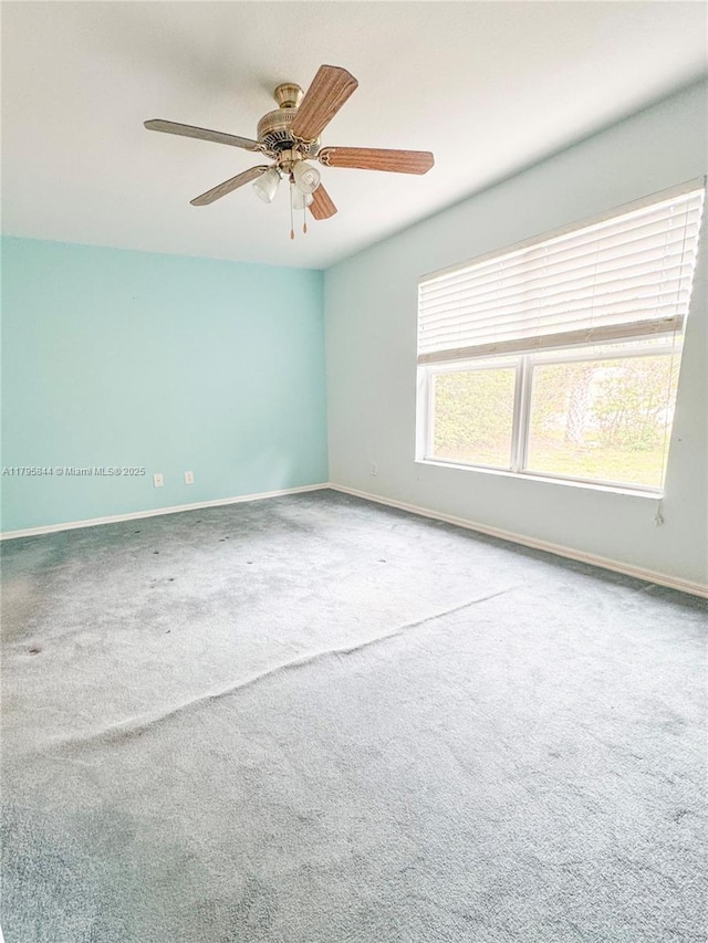 2857 Brewster St, North Port, FL 34288 - carpeted empty room featuring baseboards and ceiling fan