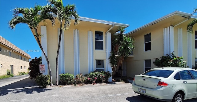 exterior space with uncovered parking