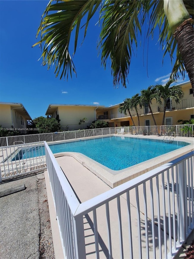 community pool with fence