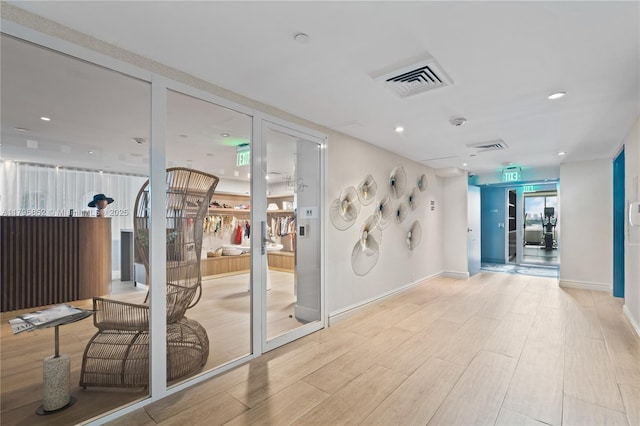 building lobby featuring visible vents