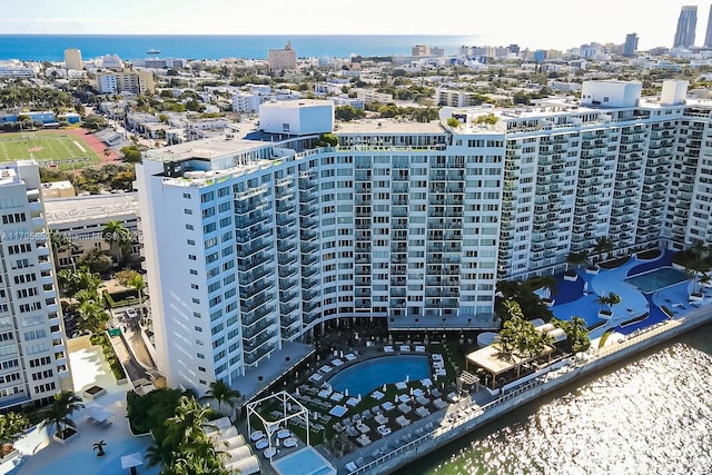 aerial view featuring a city view and a water view