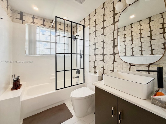 bathroom with tile patterned flooring, vanity, toilet, shower / washtub combination, and visible vents