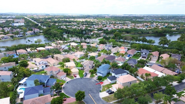 aerial view featuring a water view and a residential view