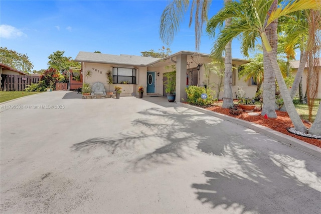 7618 NW 88th Cir, Tamarac, FL 33321 - view of front of house with stucco siding