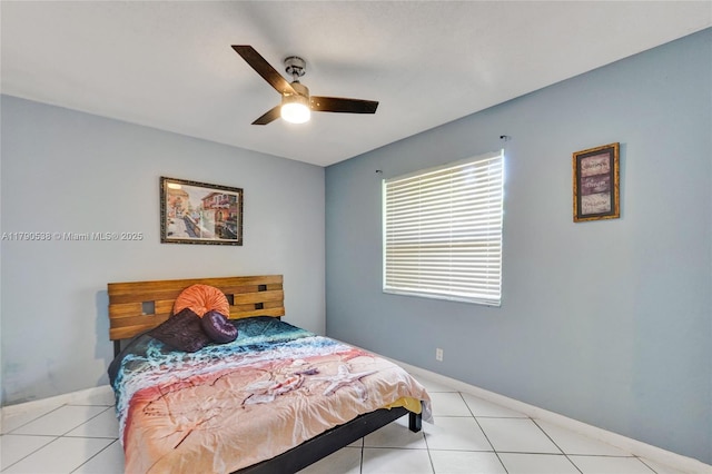 7618 NW 88th Cir, Tamarac, FL 33321 - bedroom featuring light tile patterned floors, a ceiling fan, and baseboards