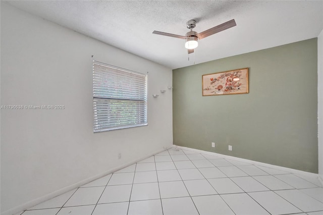 7618 NW 88th Cir, Tamarac, FL 33321 - empty room with ceiling fan, a textured ceiling, and baseboards
