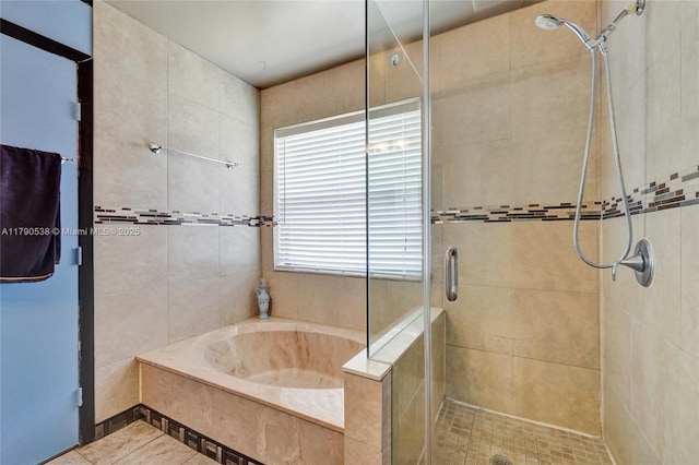 7618 NW 88th Cir, Tamarac, FL 33321 - full bath with a stall shower, a garden tub, and tile patterned flooring