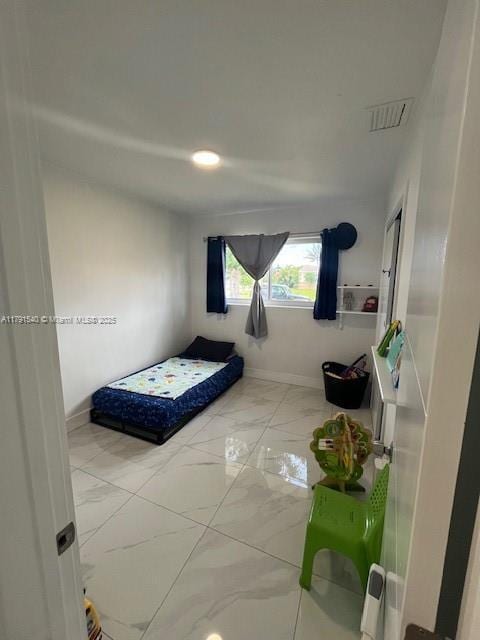 bedroom with recessed lighting, baseboards, marble finish floor, and visible vents