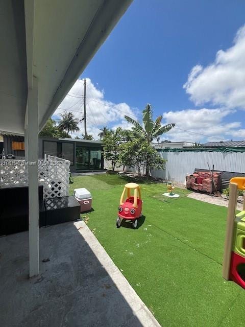 view of yard featuring a fenced backyard and a patio area