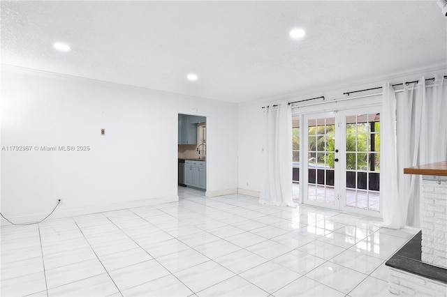 unfurnished room with ornamental molding, french doors, recessed lighting, and light tile patterned flooring