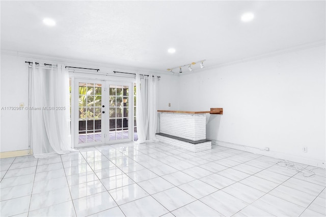 spare room with light tile patterned flooring, baseboards, recessed lighting, and french doors