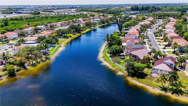 aerial view with a water view and a residential view