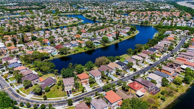aerial view with a water view and a residential view