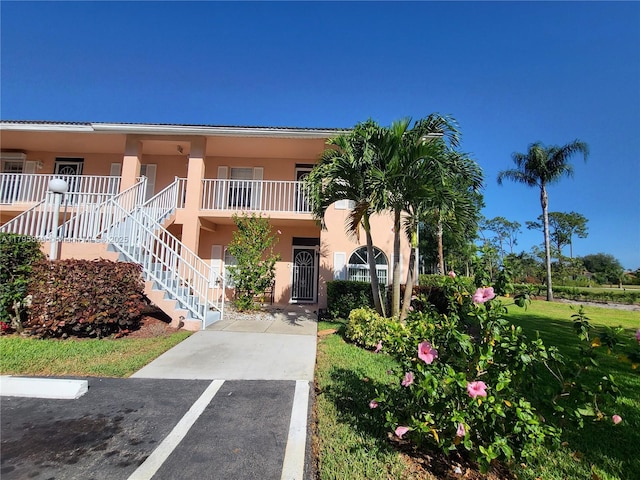 575 Augusta Blvd Unit 8, Naples, FL 34113 - view of property with stairs