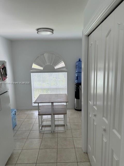 575 Augusta Blvd Unit 8, Naples, FL 34113 - dining area with light tile patterned floors
