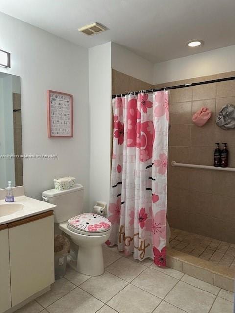 575 Augusta Blvd Unit 8, Naples, FL 34113 - full bathroom featuring toilet, tile patterned floors, visible vents, and tiled shower