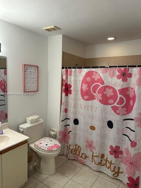 575 Augusta Blvd Unit 8, Naples, FL 34113 - full bathroom with tile patterned flooring, visible vents, vanity, toilet, and recessed lighting