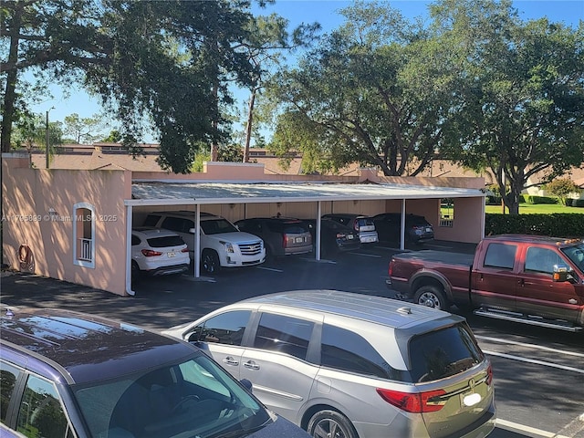 575 Augusta Blvd Unit 8, Naples, FL 34113 - view of partially covered parking lot