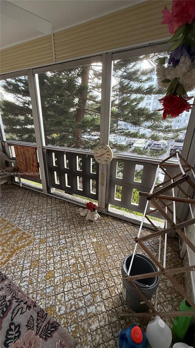 4330 Hillcrest Dr Unit 214, Hollywood, FL 33021 - unfurnished sunroom featuring plenty of natural light
