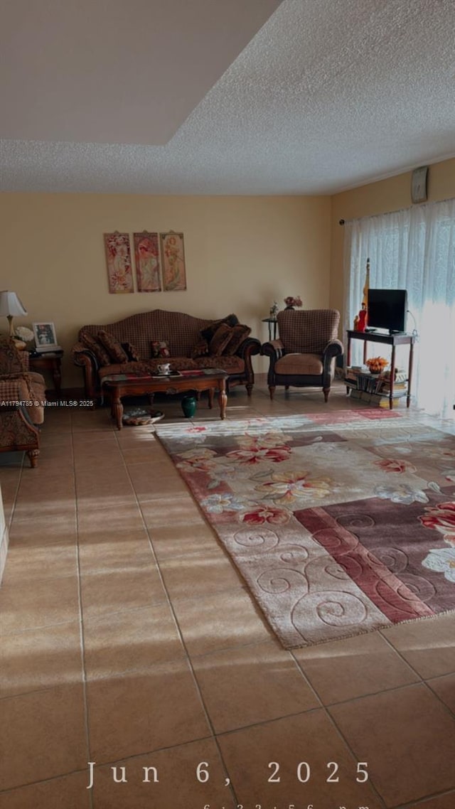 4330 Hillcrest Dr Unit 214, Hollywood, FL 33021 - living area with tile patterned floors and a textured ceiling