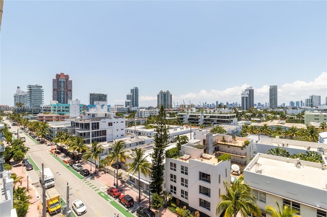 birds eye view of property with a view of city