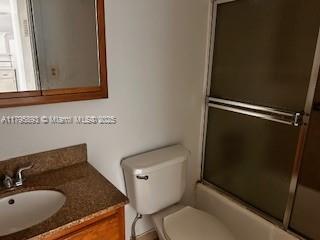 345 Ocean Dr Unit 904, Miami Beach, FL 33139 - bathroom featuring vanity and combined bath / shower with glass door