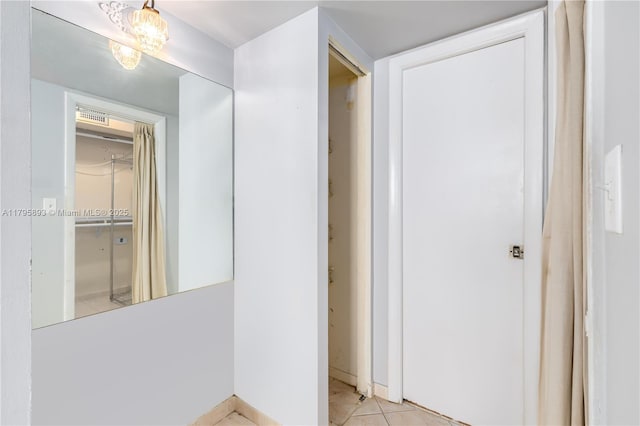 345 Ocean Dr Unit 904, Miami Beach, FL 33139 - corridor featuring light tile patterned flooring